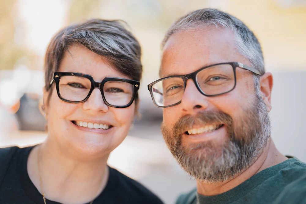 A smiling couple in their forties